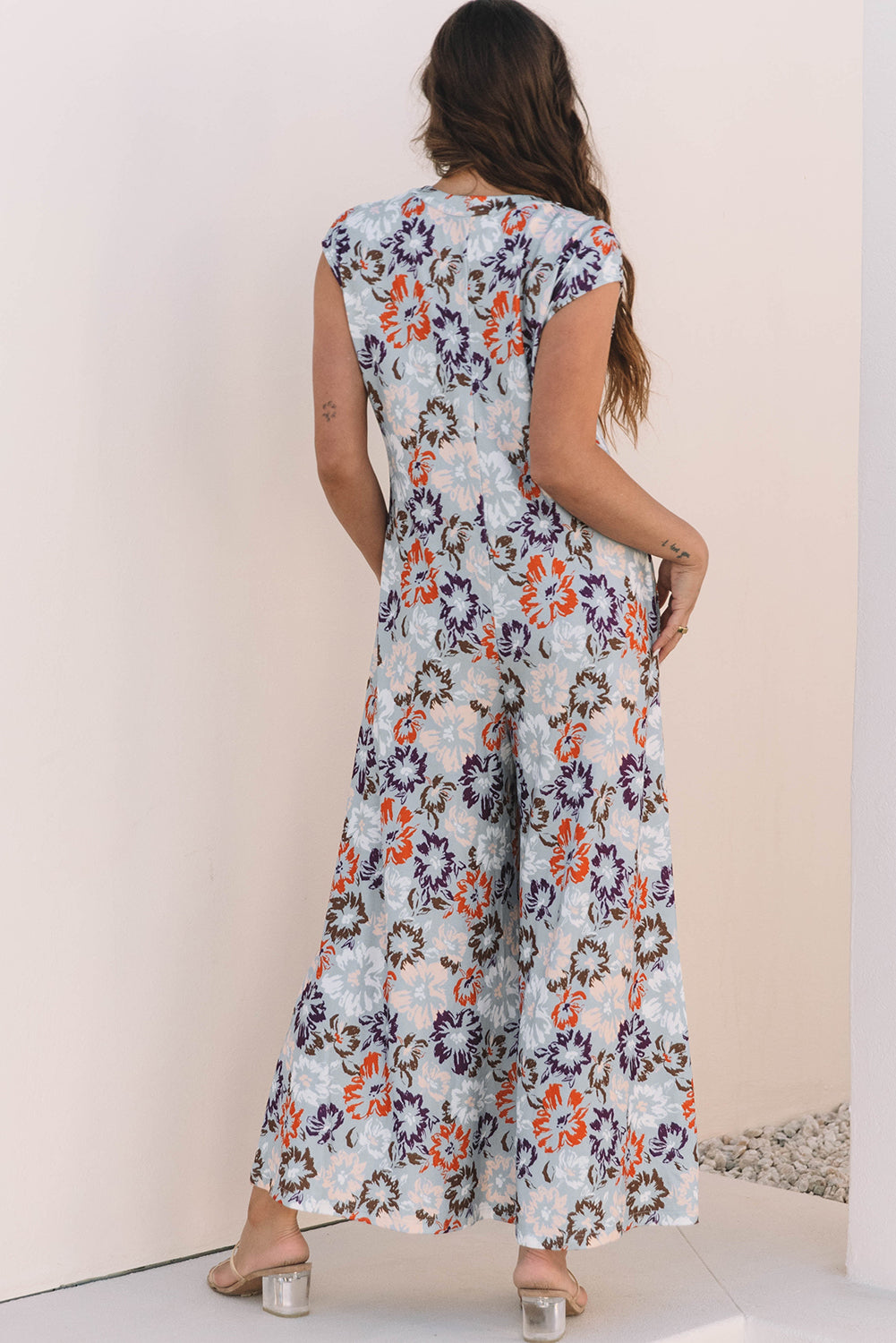 Stacey B's Sky Blue Floral Sleeveless Buttoned Pocketed Wide Leg Jumpsuit