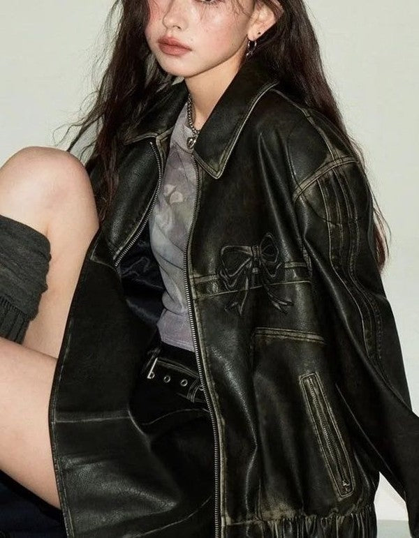 Stacey B's Faux leather bow biker jacket