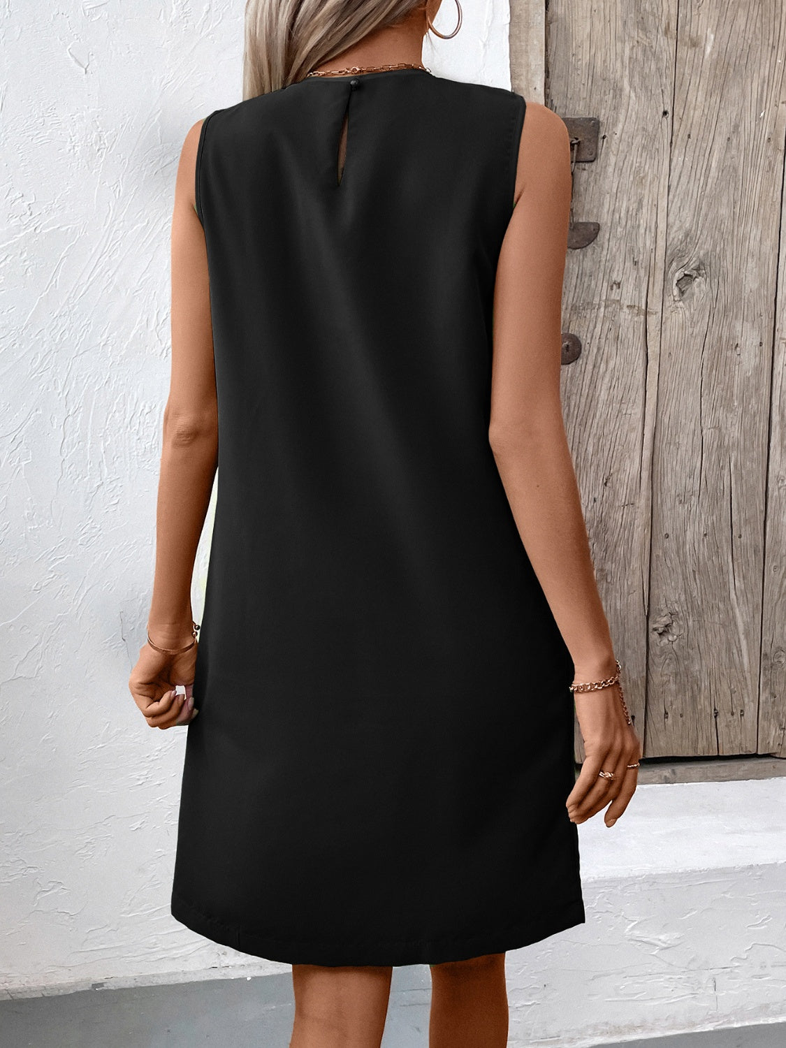 Stacey B's Pocketed Round Neck Sleeveless Mini Dress