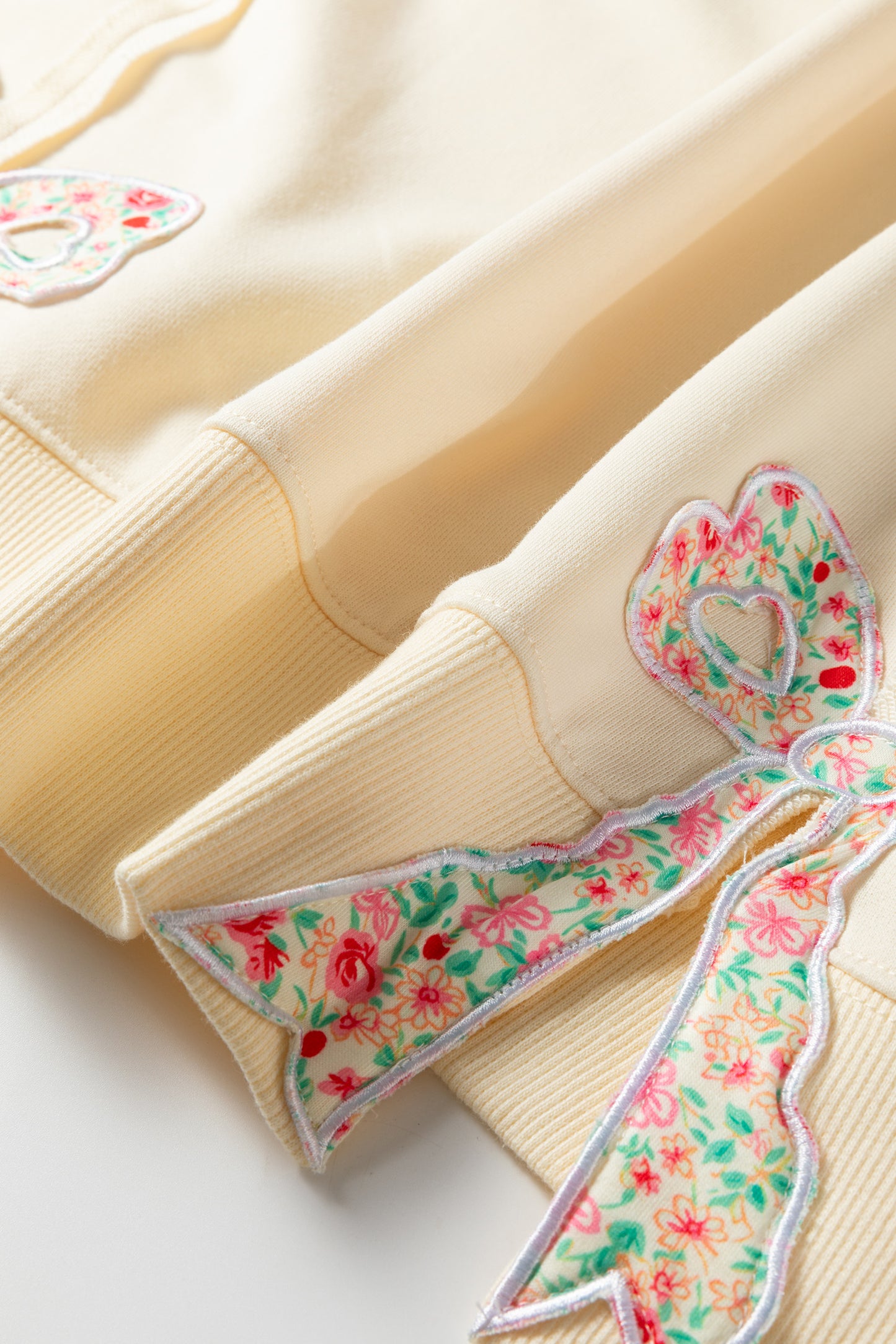 Stacey B's Beige Plus Size Raw Seam Detail Floral Bow Patched Baggy Pullover