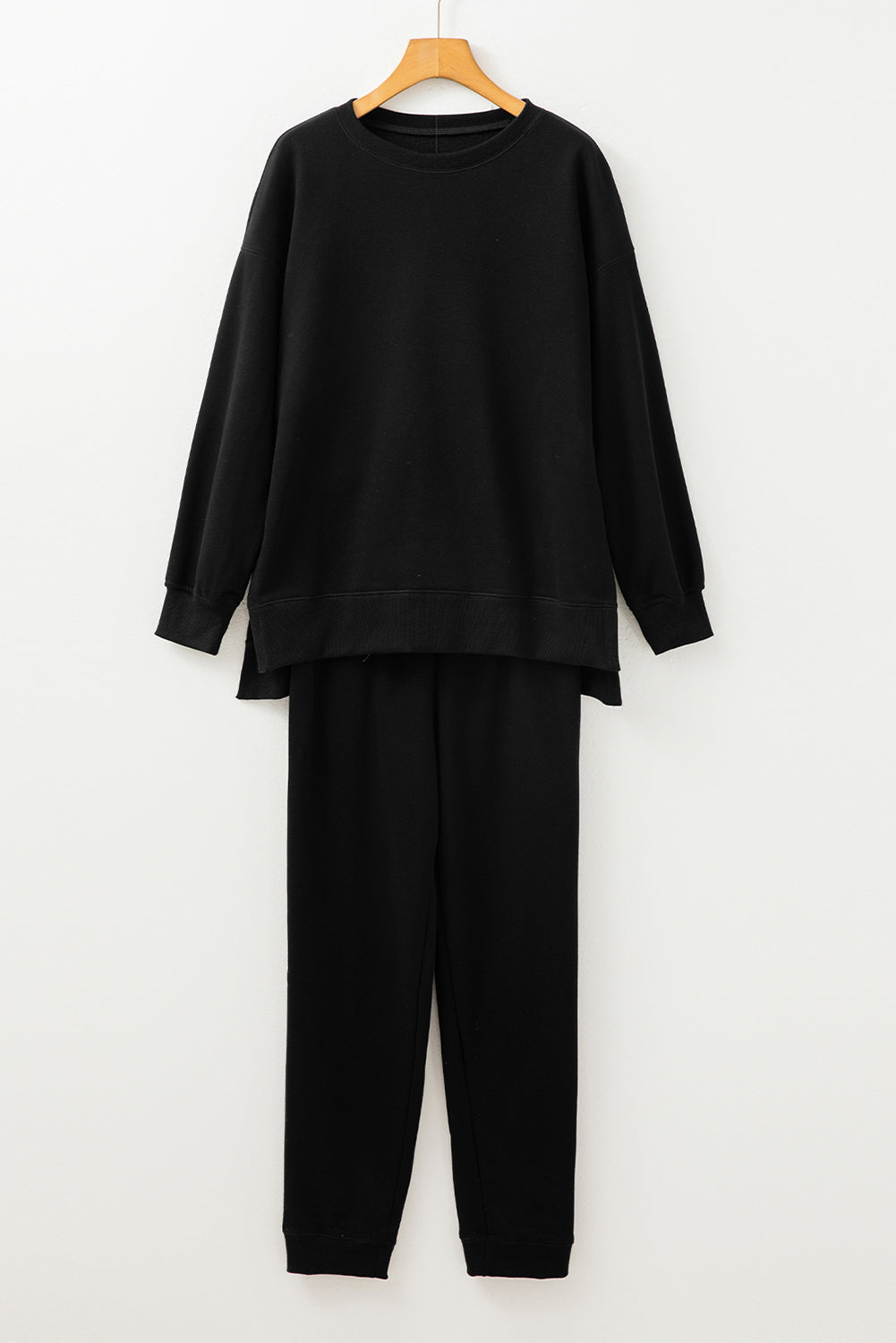 Stacey B's Black Solid Color High Low Pullover and Skinny Pants Set