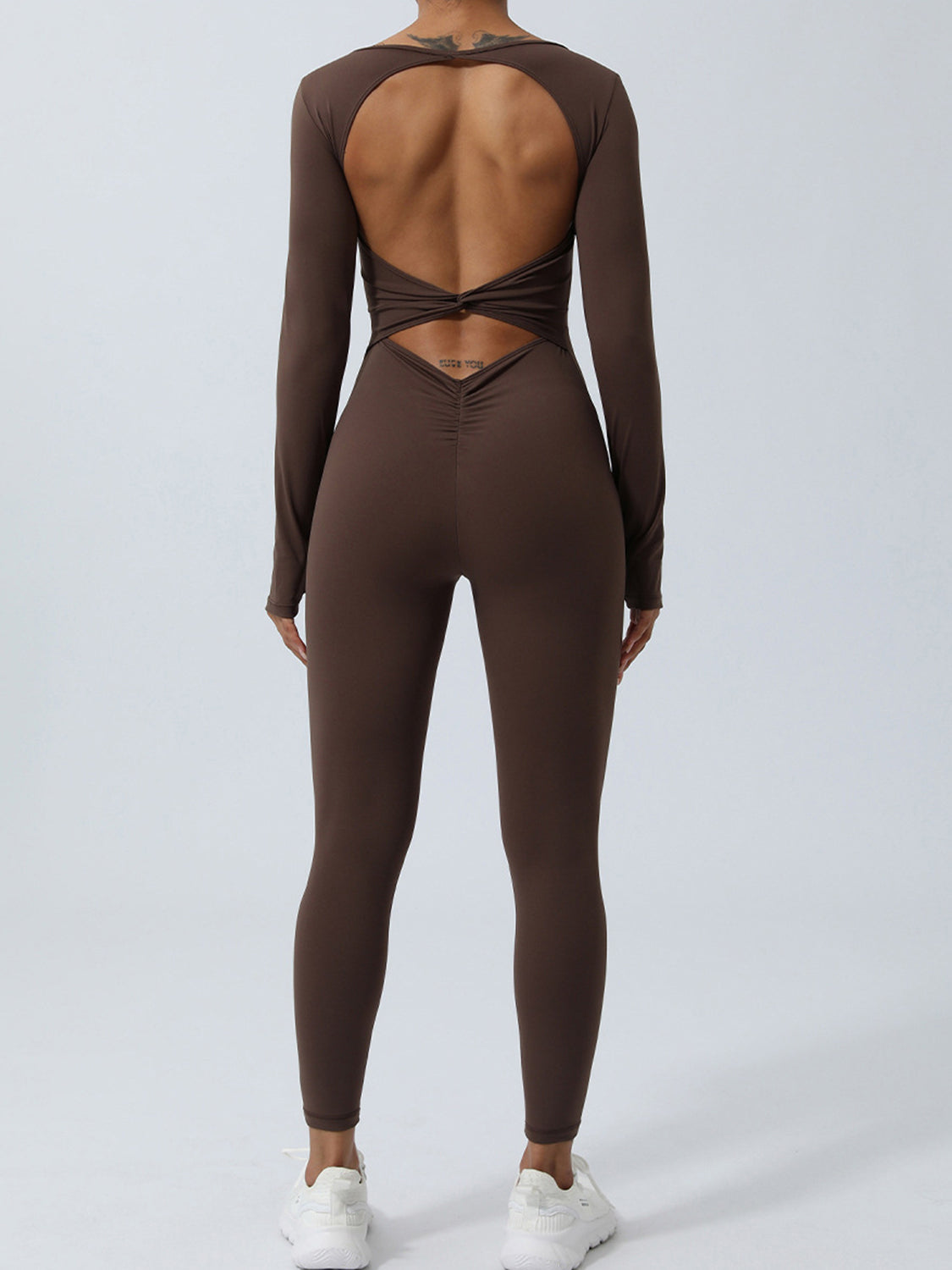 Stacey B's Twisted Backless Long Sleeve Jumpsuit