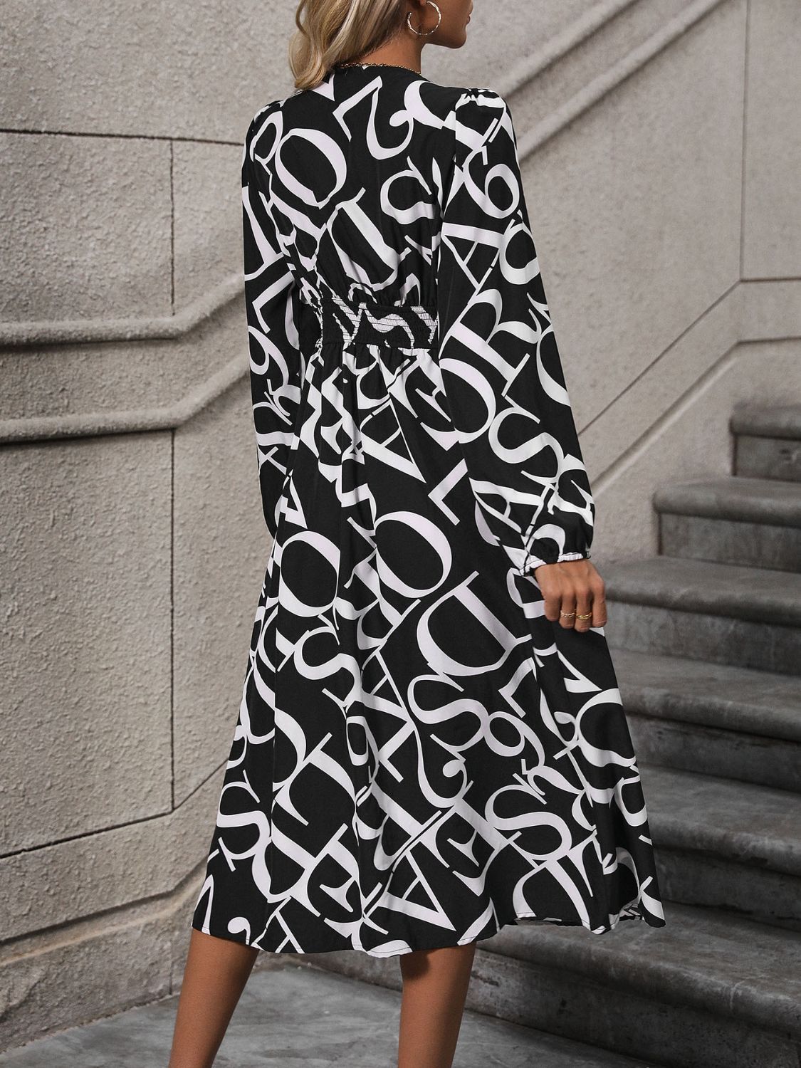 Stacey B's Printed V-Neck Long Sleeve Midi Dress