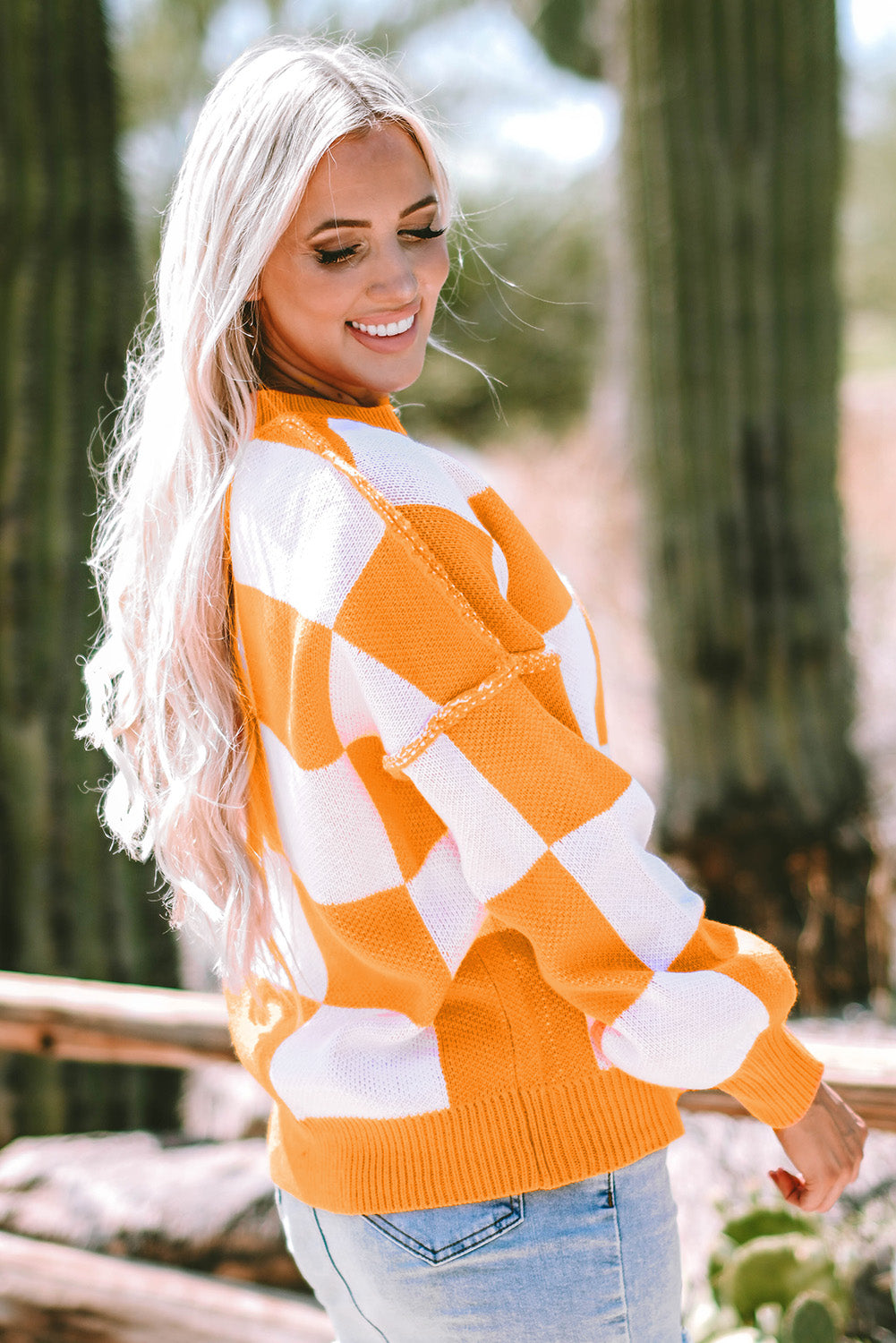 Stacey B's Orange Checkered Bishop Sleeve Sweater