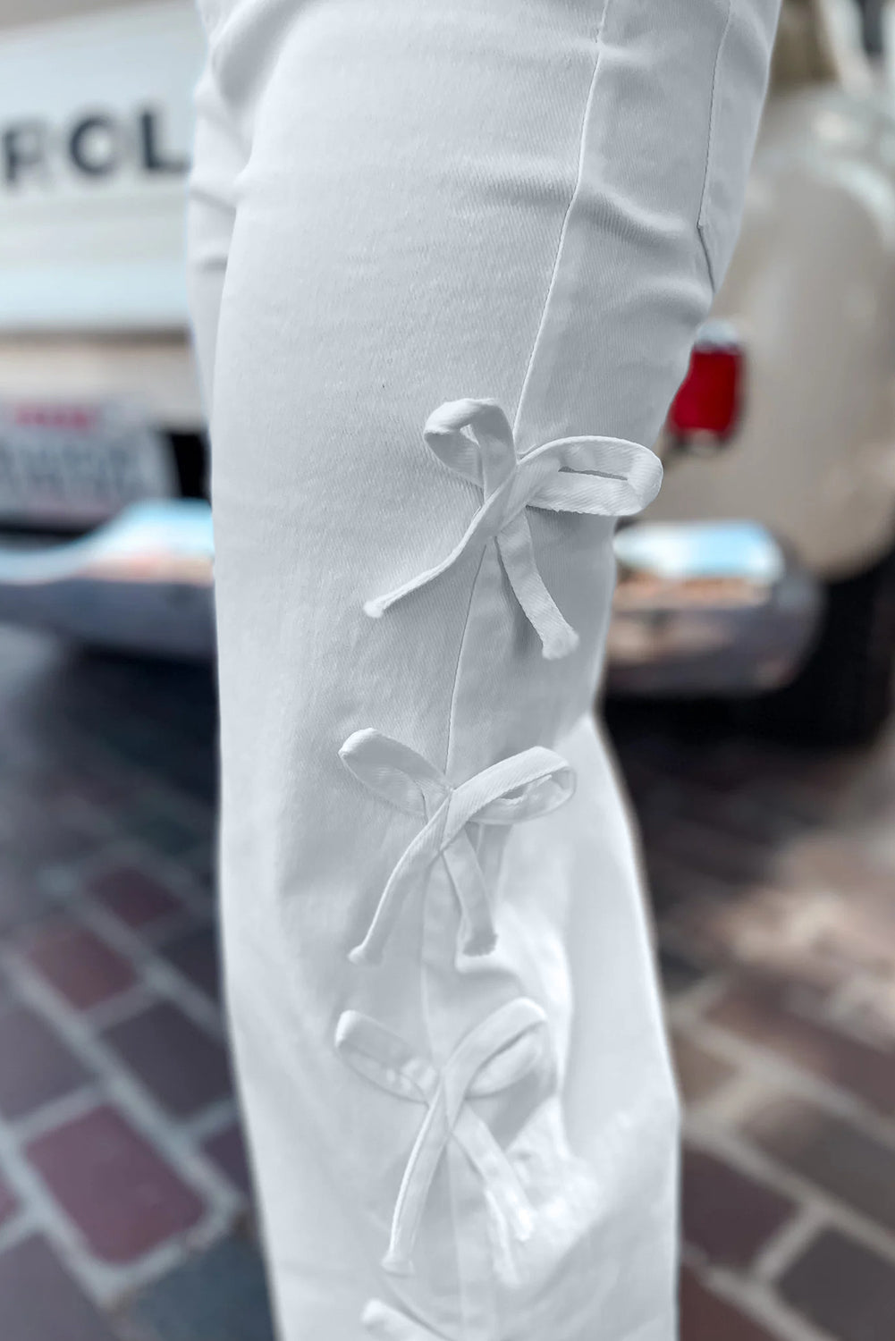 Stacey B's White Bow Knot Side Detail Straight Leg Loose Jeans
