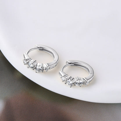 Stacey B's 925 Sterling Silver Moissanite Huggie Earrings