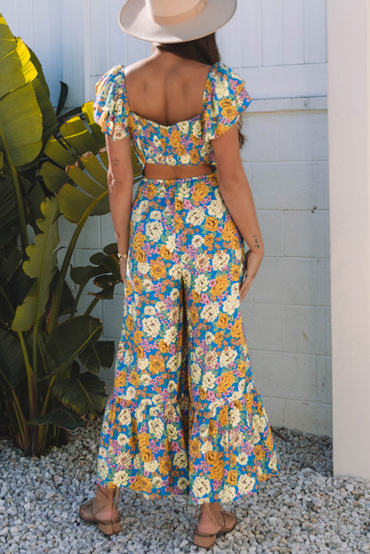 Stacey B's Yellow Floral Allover Print Shirred Cut Out High Waist Jumpsuit
