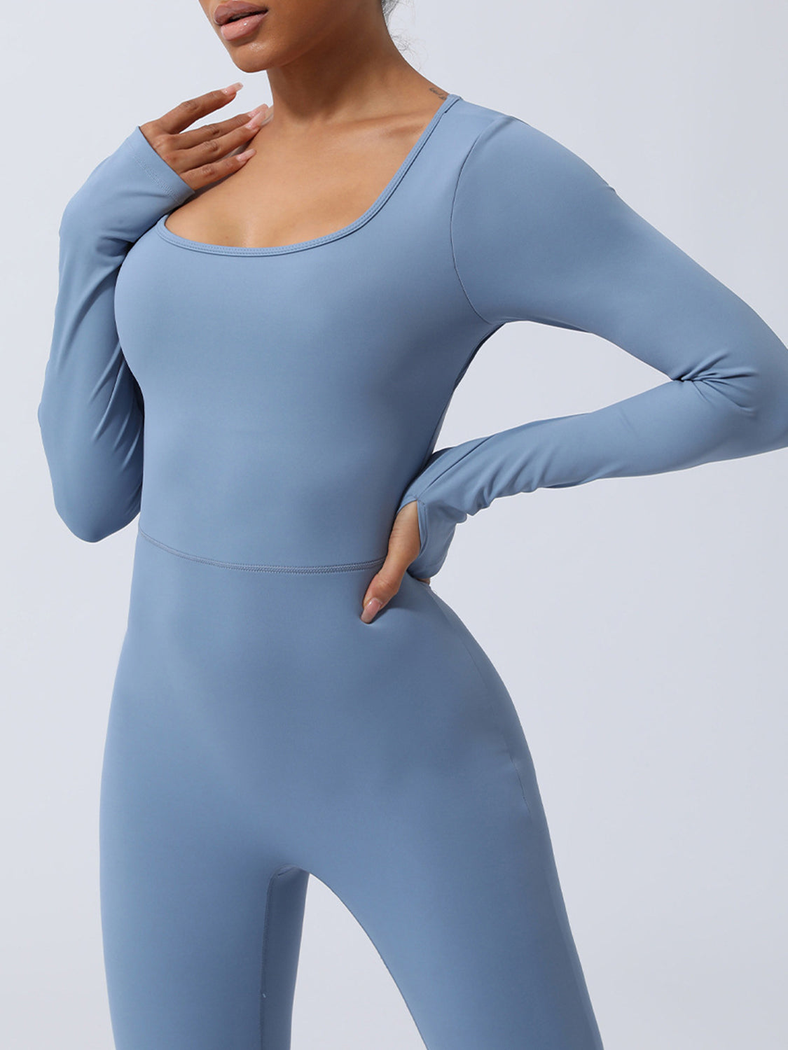 Stacey B's Twisted Backless Long Sleeve Jumpsuit