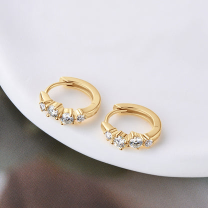 Stacey B's 925 Sterling Silver Moissanite Huggie Earrings