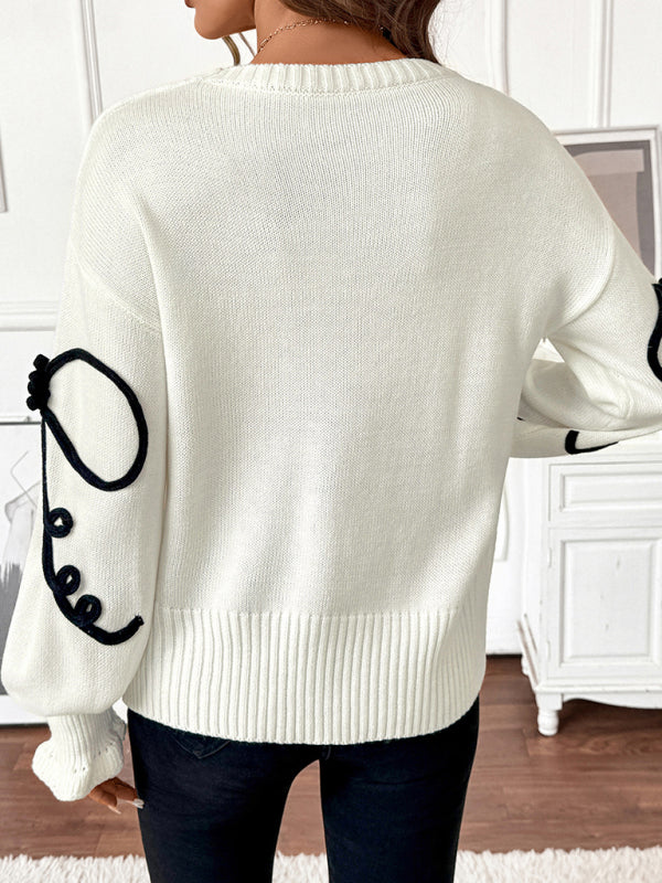 Stacey B's Playful and sweet loose bow-decorated round-neck sweater